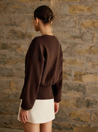 Alma – Feinstrick - Cardigan mit Skulptur - Knopf - Cecile LavelleZwart