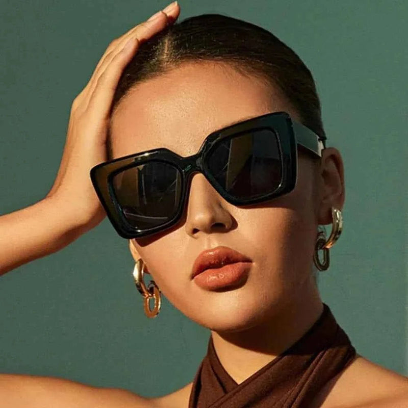 Celine – Black oversized sunglasses with angular cat-eye design