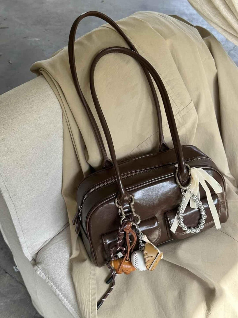 Emilia – Vintage-inspired handbag in dark brown with decorative charms
