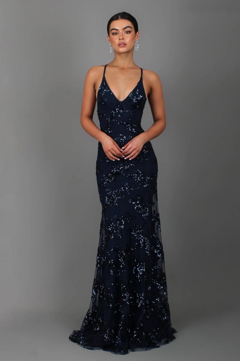 Nora – floor-length evening gown with sequin embroidery, deep back neckline, and spaghetti straps